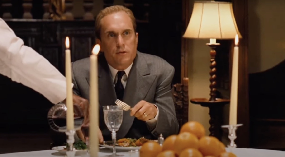 Robert Duvall sitting at table with oranges in The Godfather