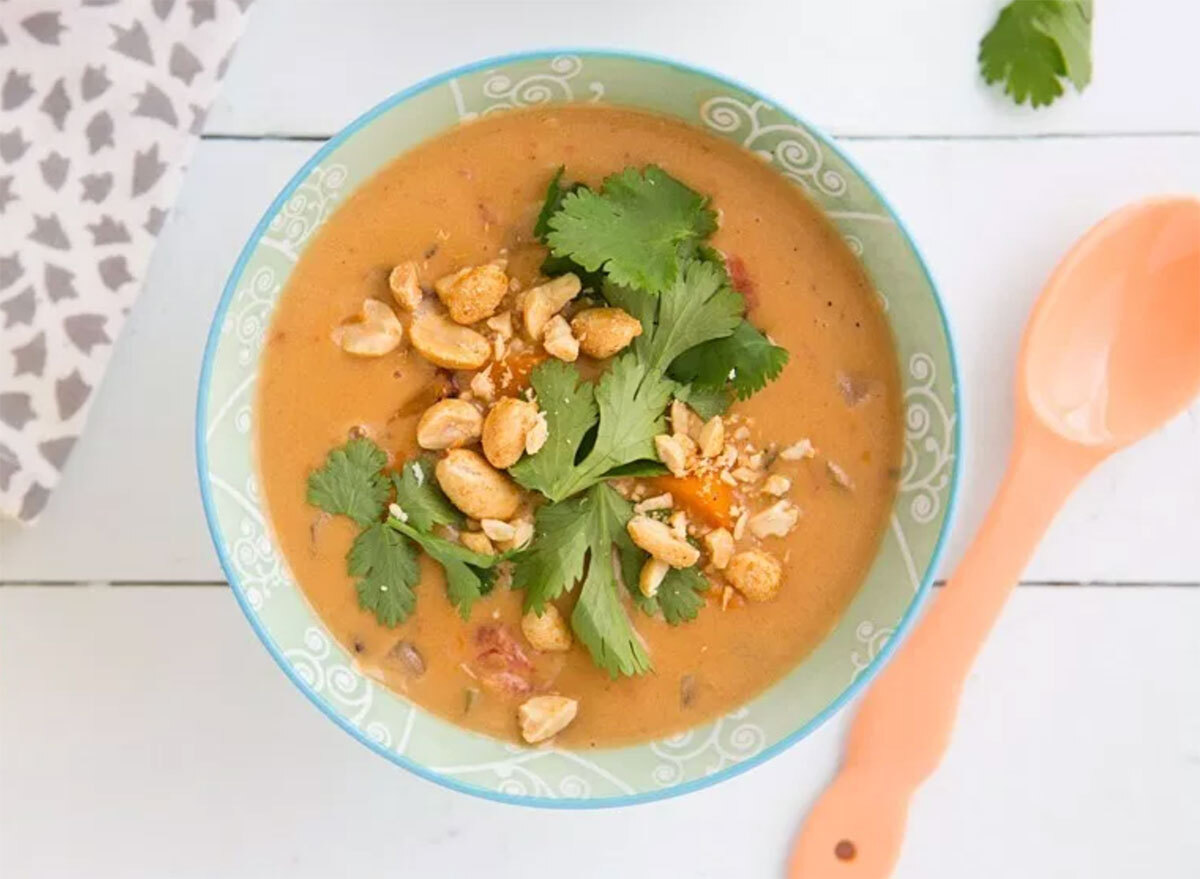 african peanut soup in bowl with spoon