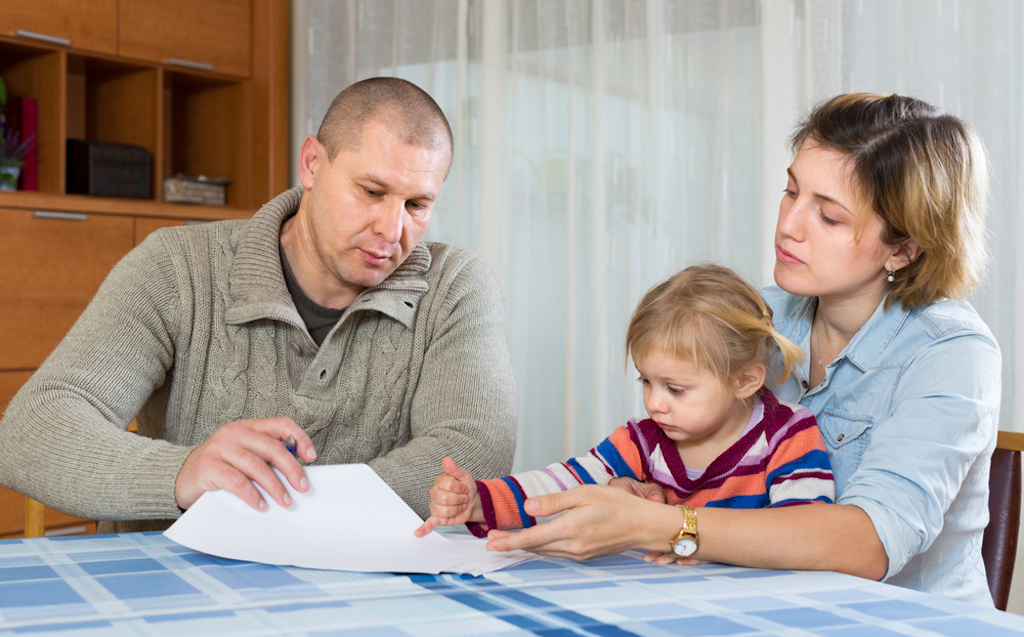 family paying bills