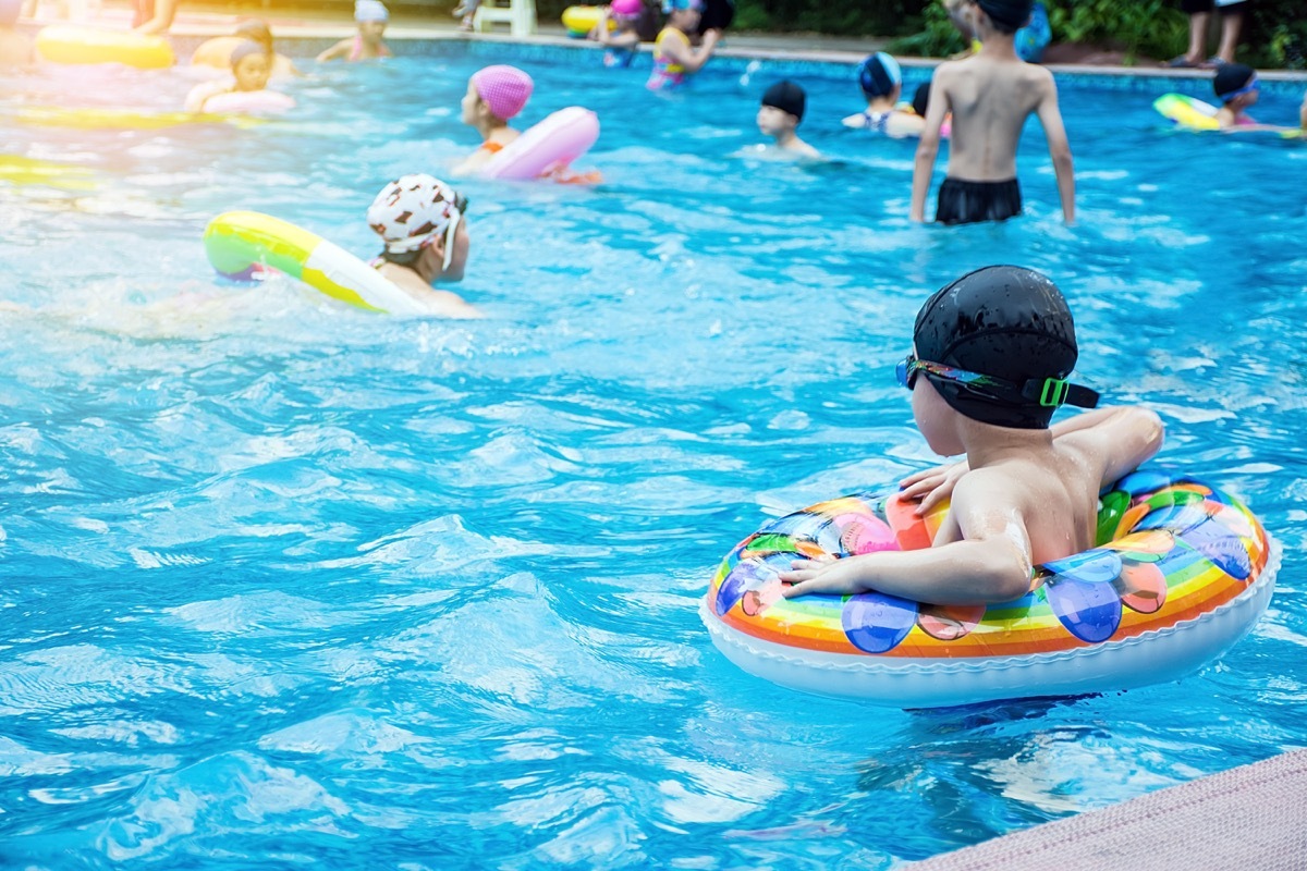 kids swimming in public pool