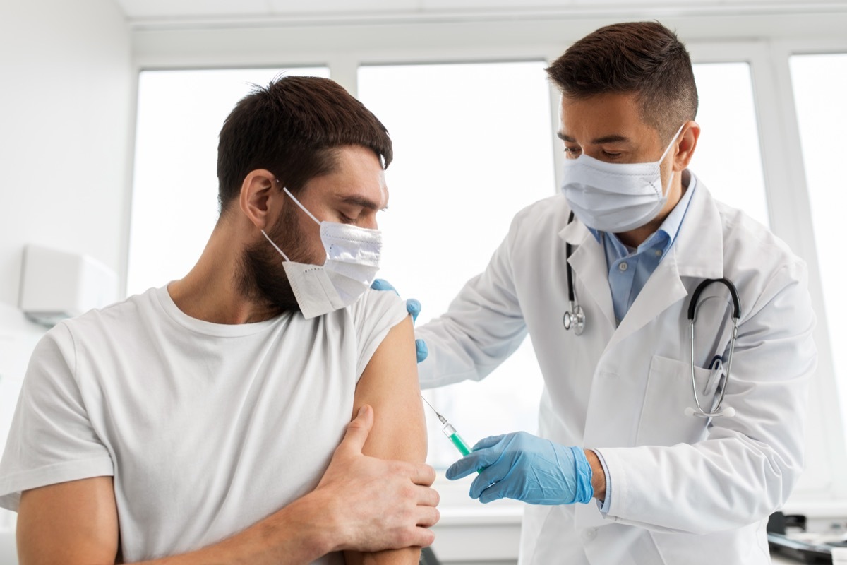Man getting COVID vaccine