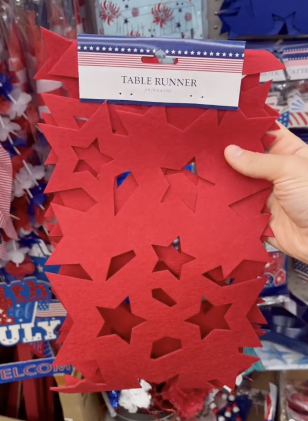 Red star-shaped table runner at Dollar Tree