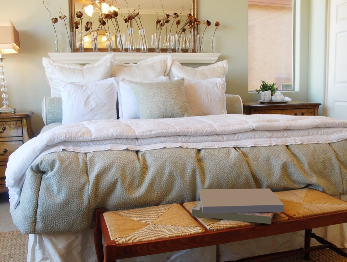 elegant bed with throw pillows 