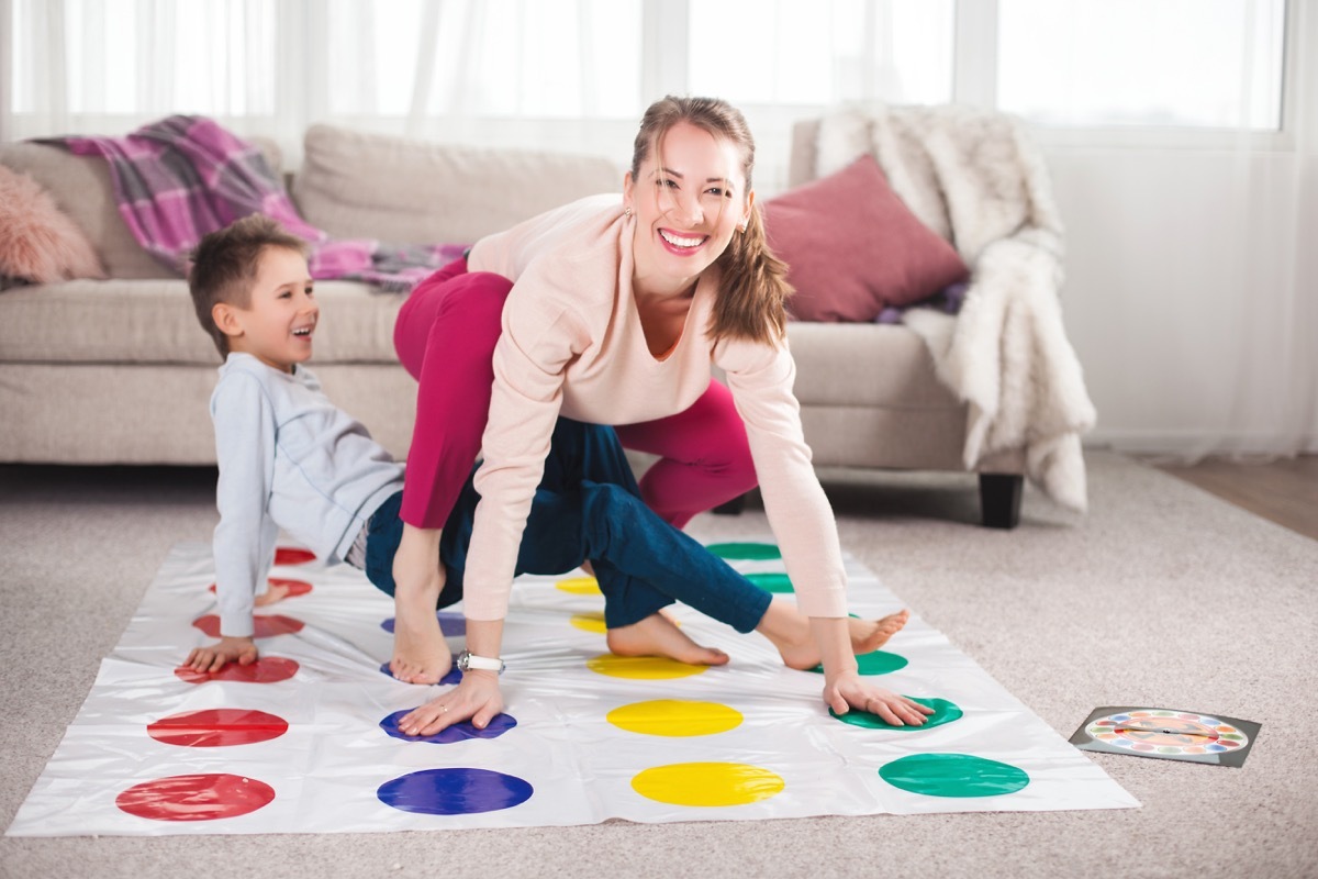 mom and son playing twister