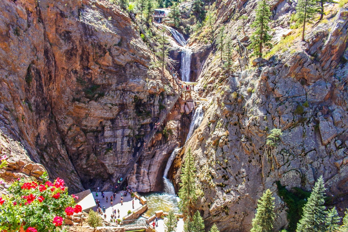 seven falls with tourists down below in Colorado
