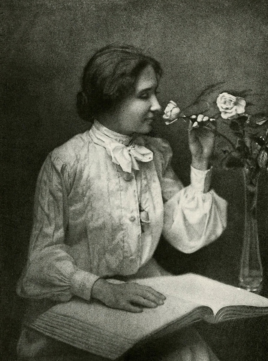 Helen Killer with book and vase of flowers