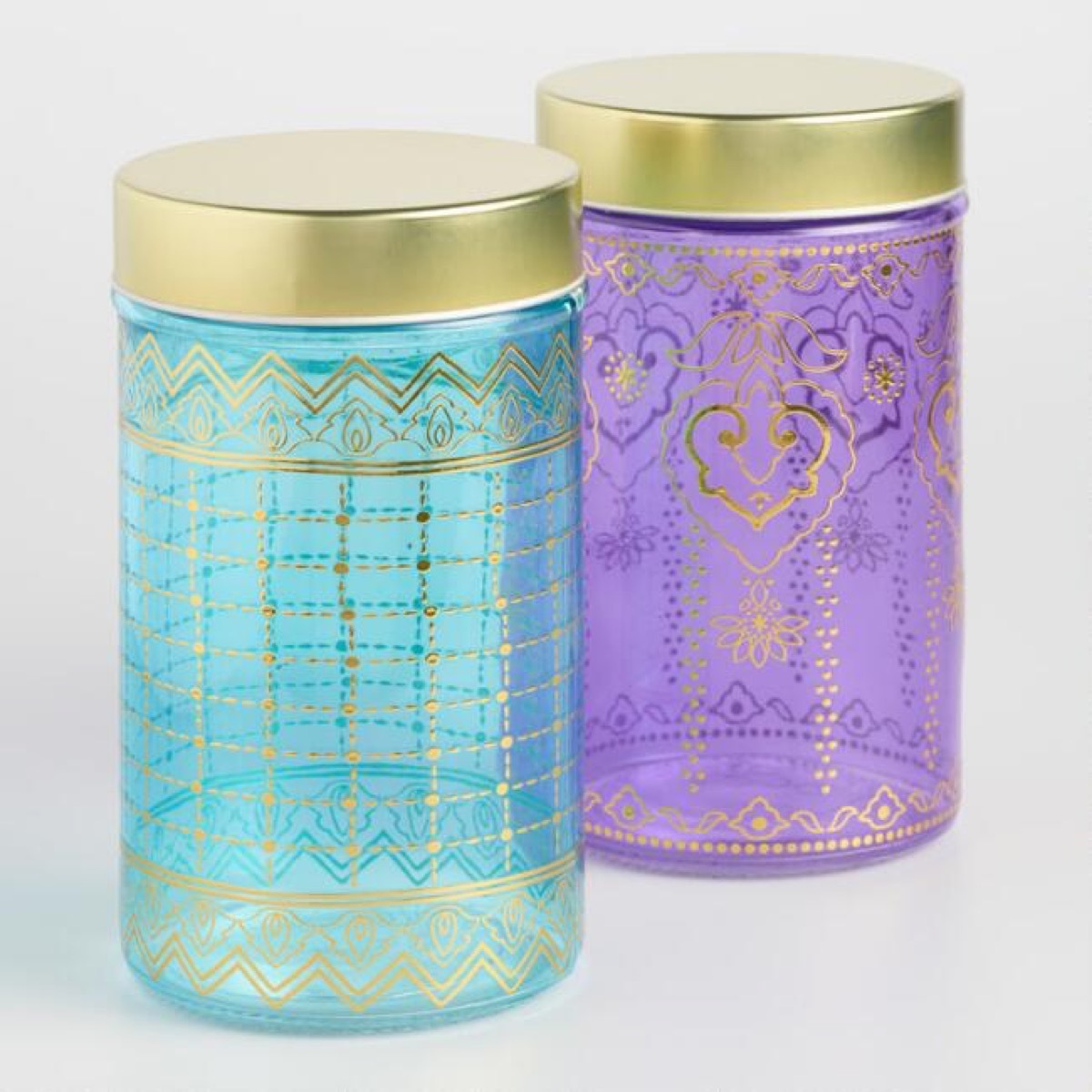 purple and green gold-topped storage containers, bathroom accessories