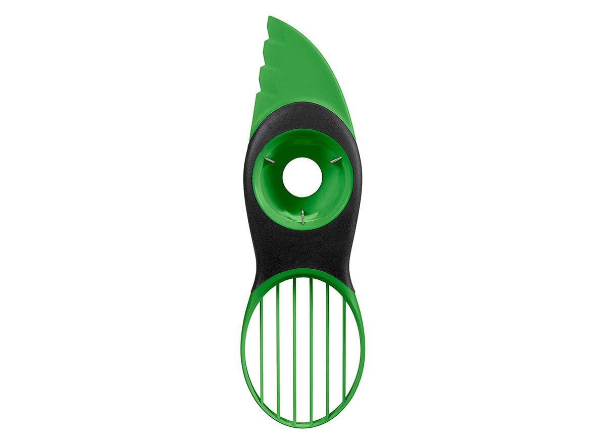 oxo green and black avocado slicer pitter cutter tool