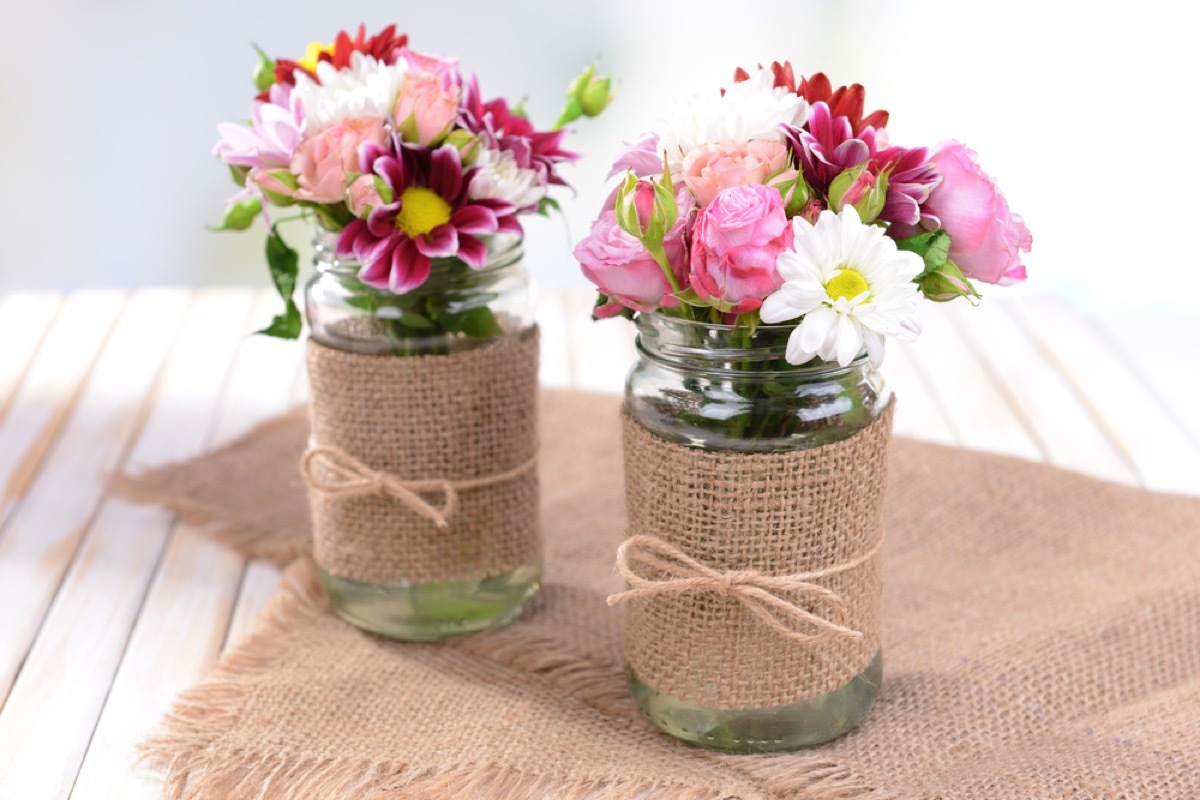 glass jars with wildflowers and burlap accent, joanna gaines tips