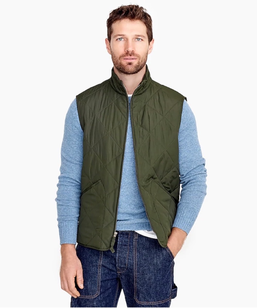 young white man in green vest